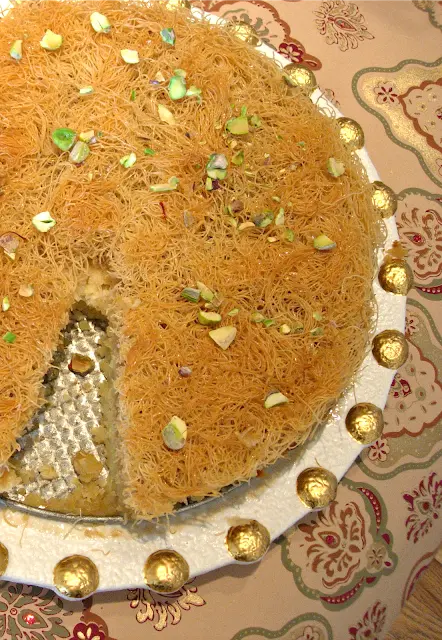 Kadaif is actually shredded pastry. It bakes into a crispy topping that covers a couscous crust topped with a delicious cheese filling. This honey type cheesecake is unusual and tastes divine!