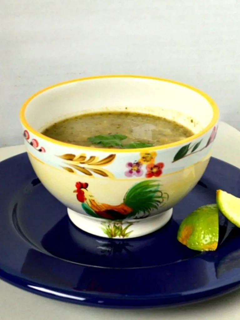 This green posole is made with fresh green herbs and black beans, tomatillos and chiles. It is great! #posole #Mexicanfood #soup www.thisishowicook.com