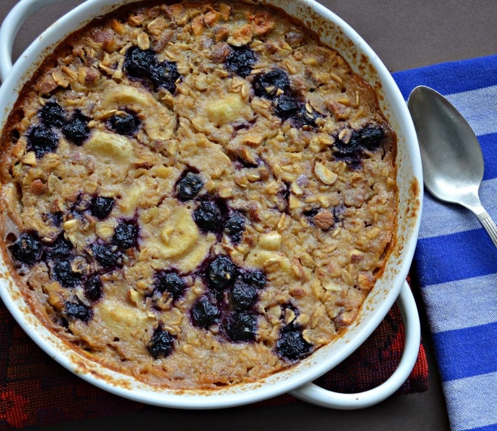 This oatmeal made with applesauce, nuts and fruit is really a great way to start the day! Easy to do and can be made ahead and reheated! #oatmeal #breakfast www.thisishowicook.com