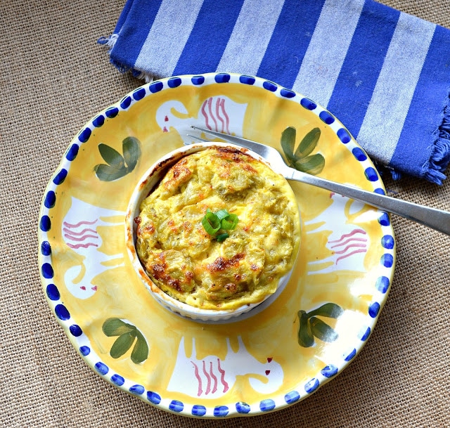 The fast and delicious egg souffle is made by layering your favorite ingredients and then pouring a combo of milk and beaten eggs over the top. It rises quite nicely and only takes 10 minutes to throw together. Perfect for brunch and makes everyone feel so special! #brunch #souffle #eggs #breakfast www.thisishowicook.com