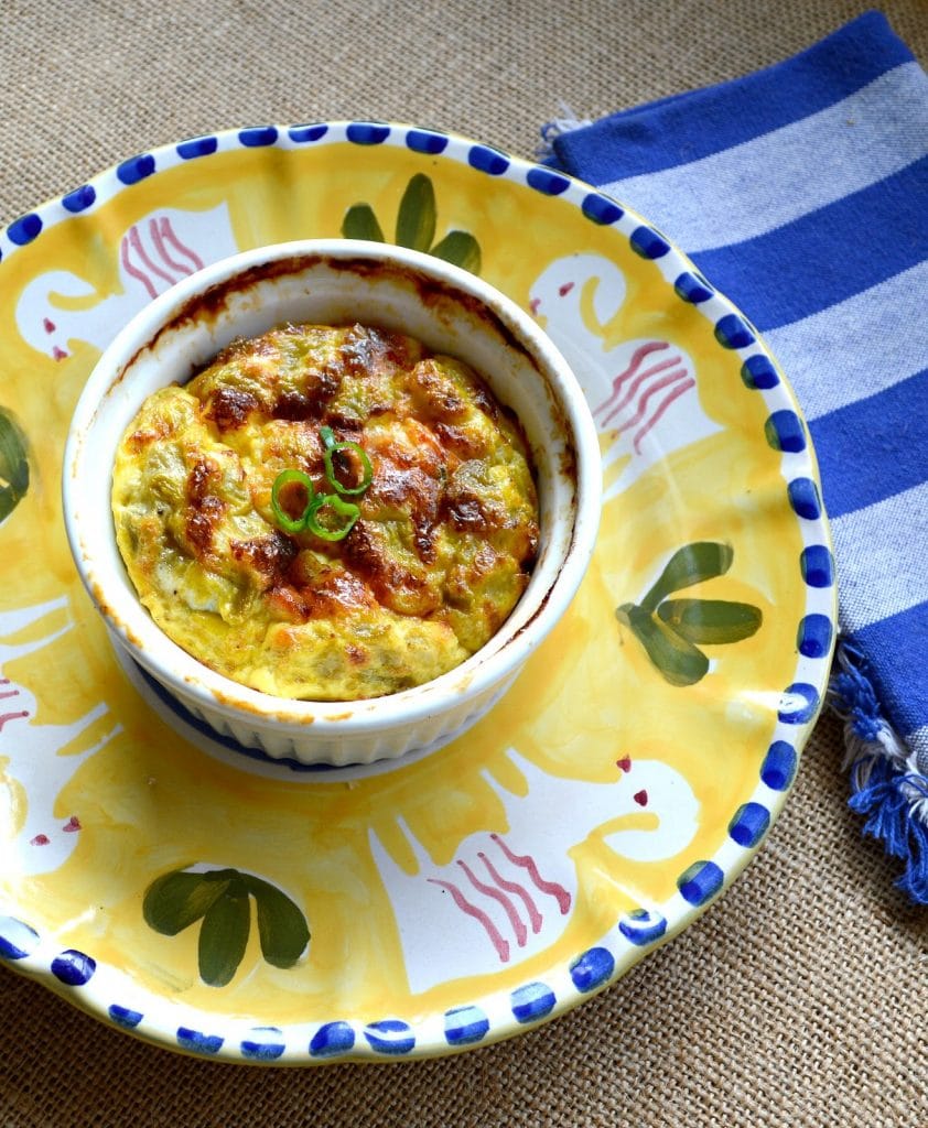 The fast and delicious egg souffle is made by layering your favorite ingredients and then pouring a combo of milk and beaten eggs over the top. It rises quite nicely and only takes 10 minutes to throw together. Perfect for brunch and makes everyone feel so special! #brunch #souffle #eggs #breakfast www.thisishowicook.com The fast and delicious egg souffle is made by layering your favorite ingredients and then pouring a combo of milk and beaten eggs over the top. It rises quite nicely and only takes 10 minutes to throw together. Perfect for brunch and makes everyone feel so special! #brunch #souffle #eggs #breakfast www.thisishowicook.com