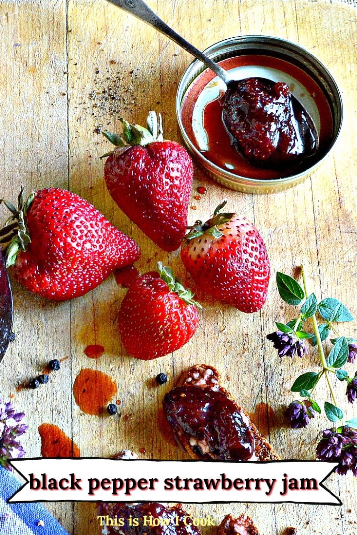 Fresh strawberries with spoonful of jam
