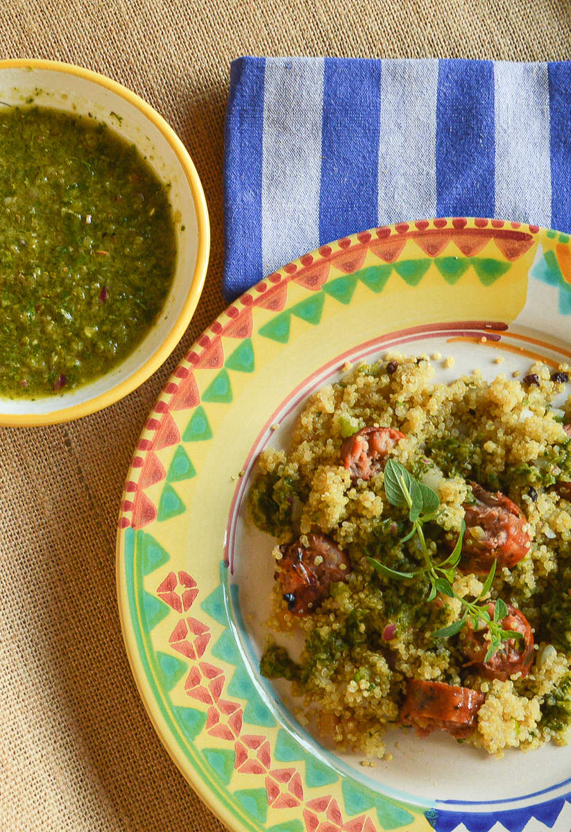 Chicmichurri in bowl/quinoa, sausage and chimichurri on yellow, green and blue plate