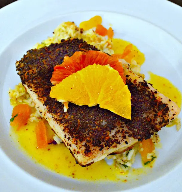 paiche, orange cacao rub, butter sauce on paiceh fish
