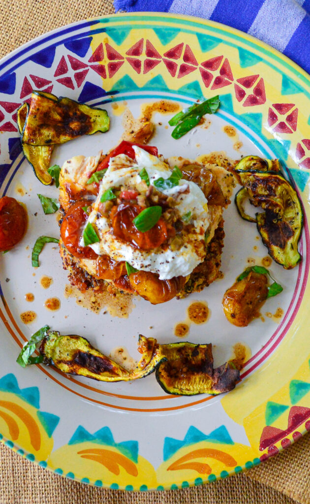 Quinoa Cakes Chicken Caprese on colorful plate