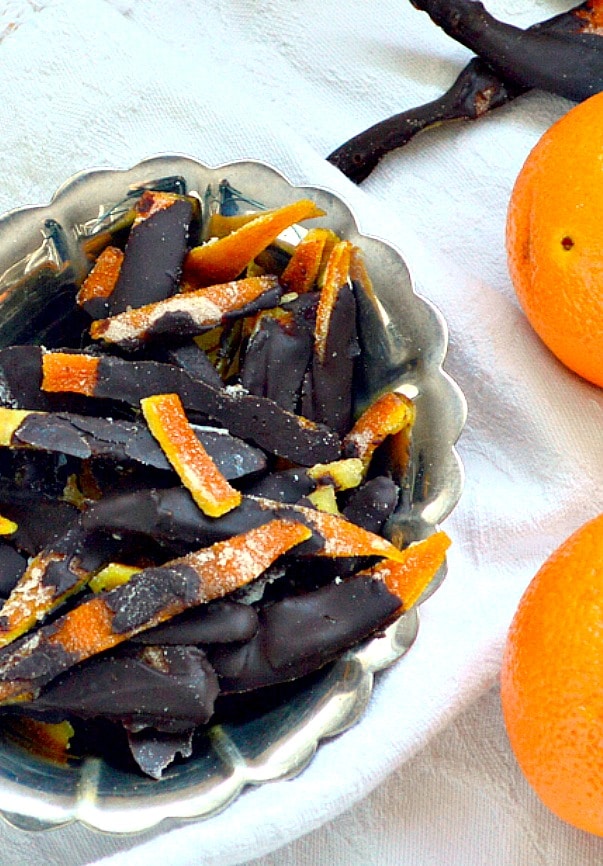 chocolate covered orange peels in silver bowl