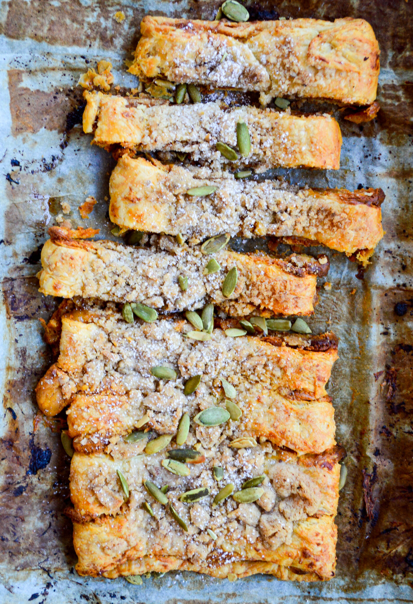 pumpkin puff pastry kringle on baking sheet