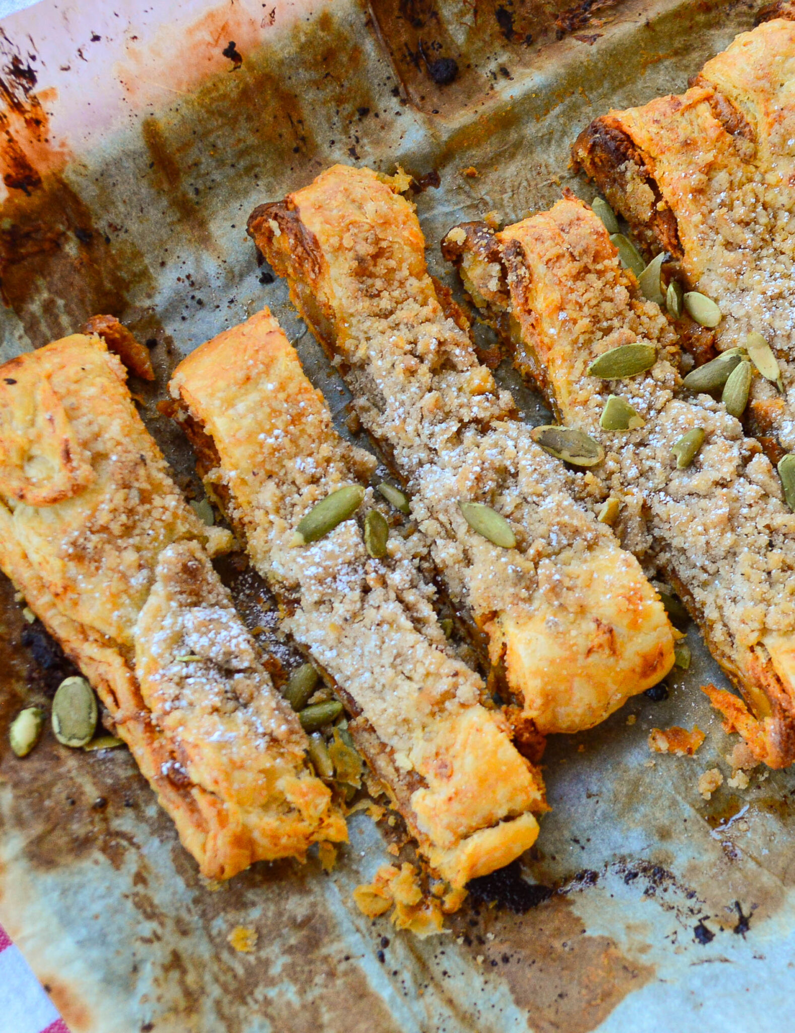 pumpkin puff pastry kringle on baking sheet