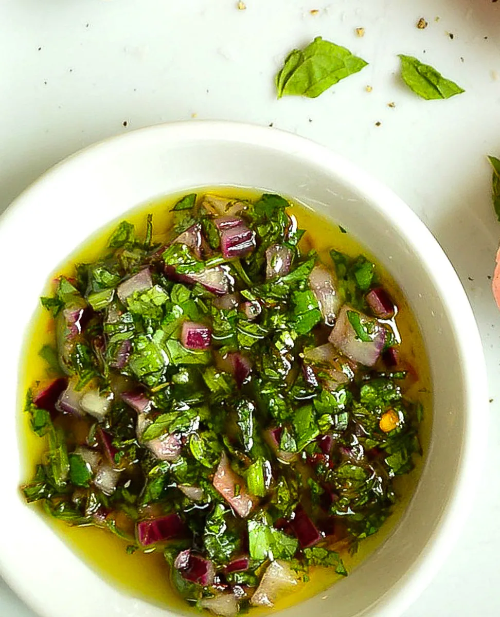 Mint chicmichurri in white bowl