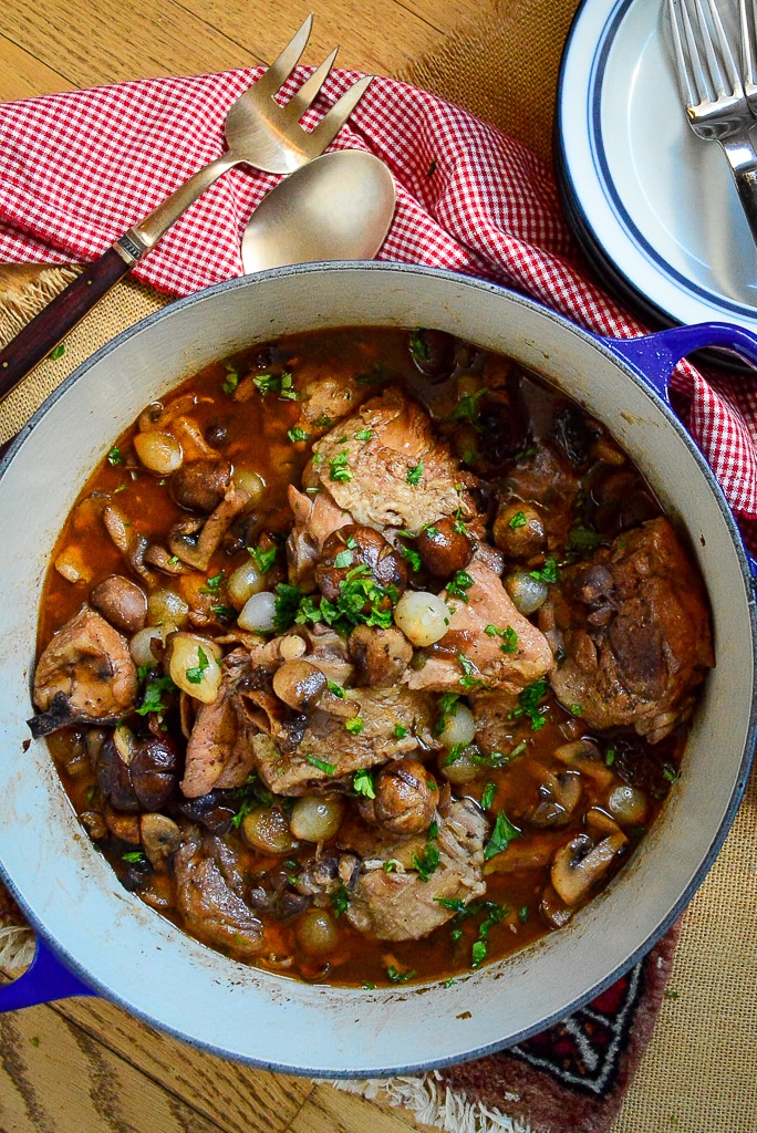 chicken in red wine in Dutch oven