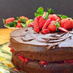 Chocolate Red Wine Cake with Strawberry Filling on a Spring Plate