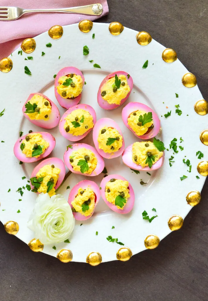 https://thisishowicook.com/wp-content/uploads/2016/05/beet-pickled-deviled-eggs-2-of-11-710x1024.jpg.webp