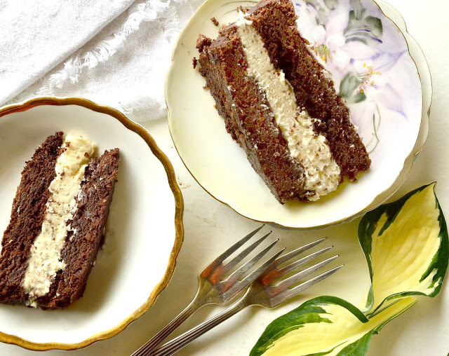 This fudgey chocolate sandwich cake is filled with and Oreo style filling. A family favorite, you will love this easy to make chocolate cake that reminds everyone of Oreos! #Oreos #chocolatecake #chocolate See more at: ThisishHowICook.com