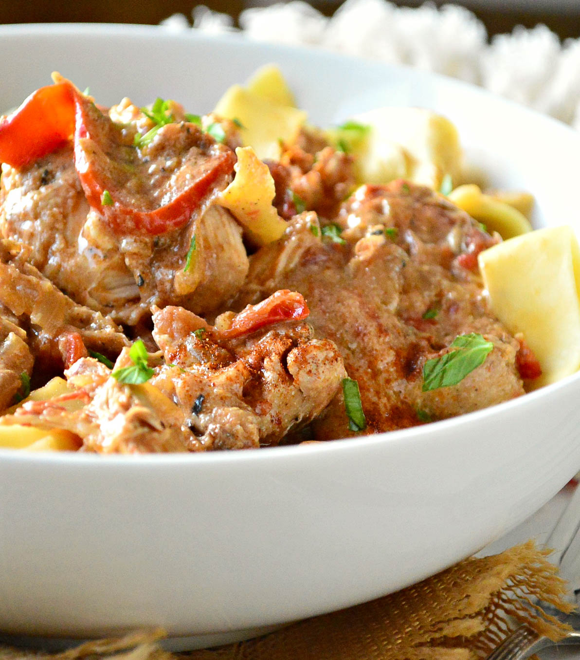 Hungarian chicken paprikash recipe in white bowl