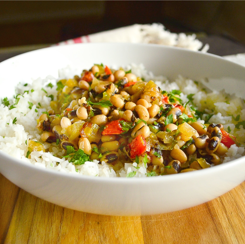 Black eyed peas with rice in white bowl