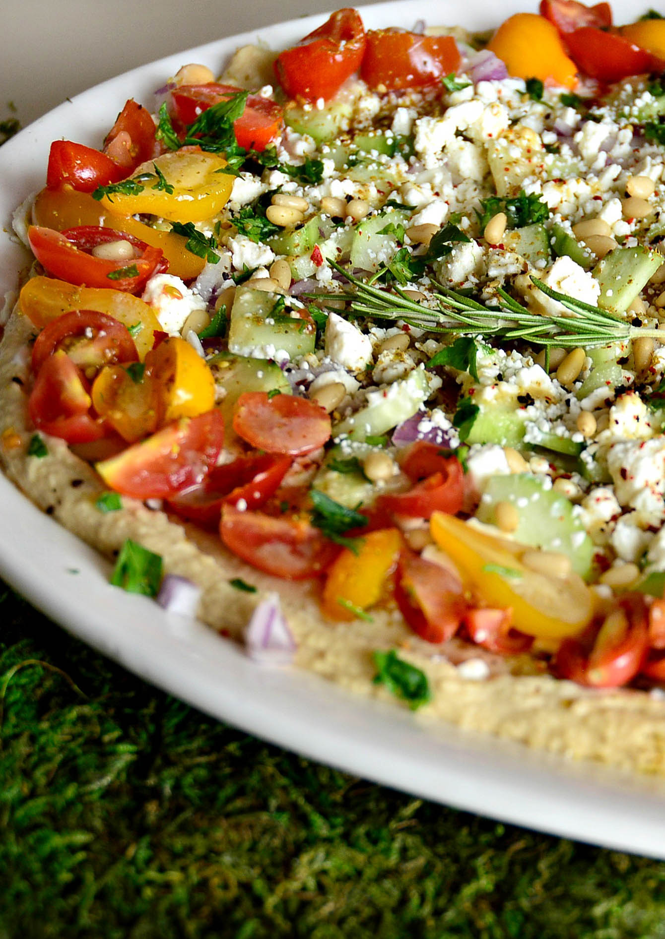 Greek dip recipes with hummus and tzatziki  and fresh tomatoes, cucmbers and feta