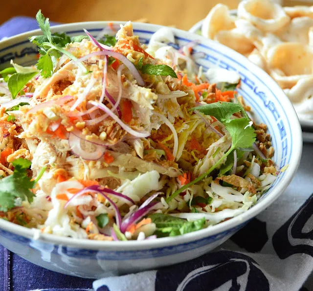 Vietnamese Chicken Salad or "Goi Ga" is an easily prepared cabbage salad, made with rotisserie chicken and lots of herbs, topped with peanuts and fried shallots, and dressed with a sweet and tart spicy dressing. #salads #chickensalad #Vietnamesefood See more at www.thisishowicook.com