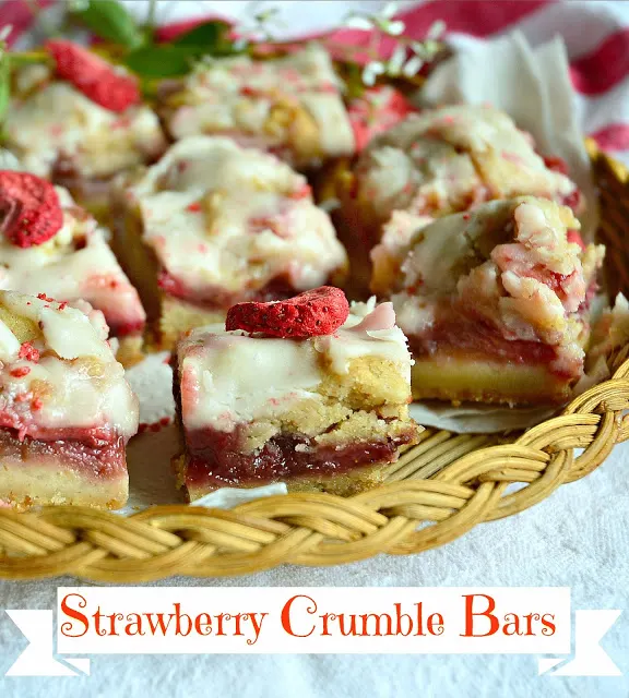 Strawberry Crumble Bars - With a buttery, crisp crust, a delectable fresh fruit filling, and a crumble of nut filled dough, these red ruby bars are truly phenomenal. Oh, I didn't mention the simple glaze that one drizzles over the top. Yum. Total Yum. Manservant told me to wrap them up and get them out of the house. Not much better compliment, than that, huh? www.thisishowicook.com #cookies #bars #strawberrydesserts