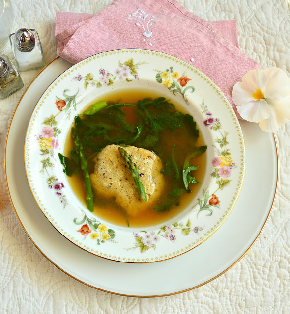 This springtime matzo egg drop soup is perfect. It solves the matzo ball dilemma of sinkers or floaters by using just matzo meal and eggs that are dropped by spoonfuls into the hot broth. This forms creative little matzo discs that I just love! #matzoballs #chickensoup #passoverrecipes www.thisishowicook.com