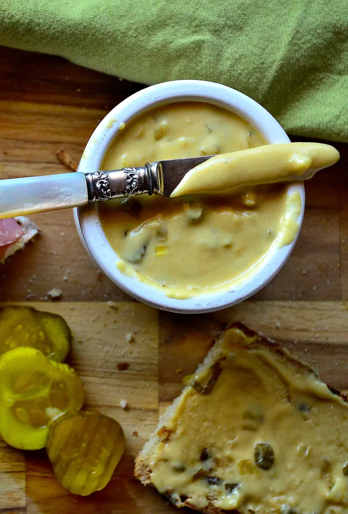 mustard in crock with pearl knife