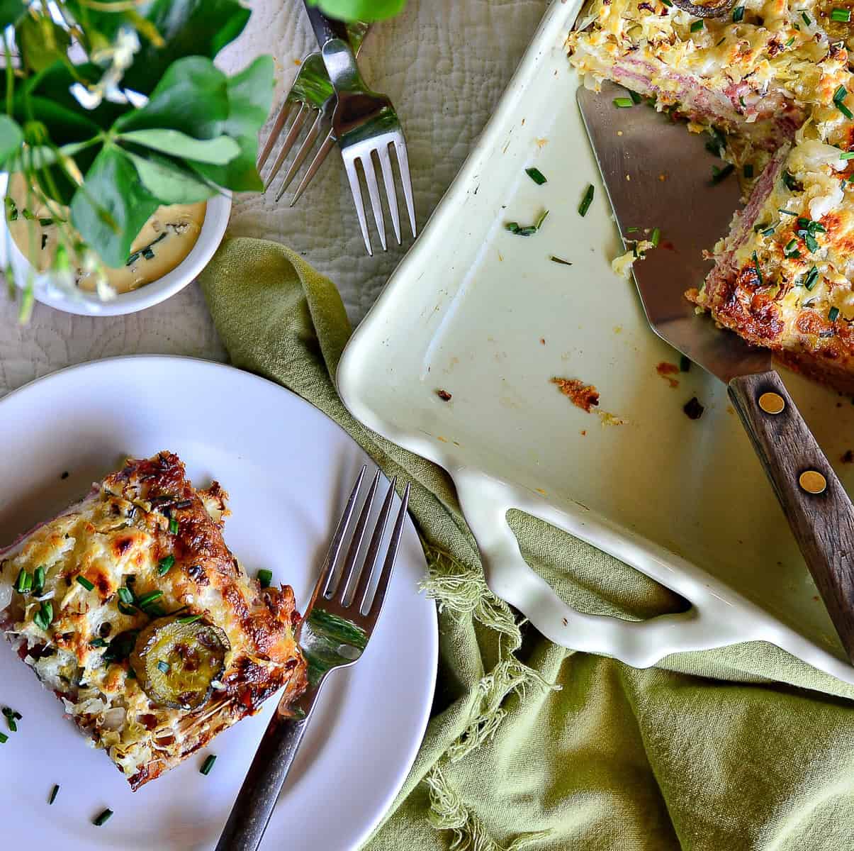 square of reuben casserole and a casserole dish with a reuben bake