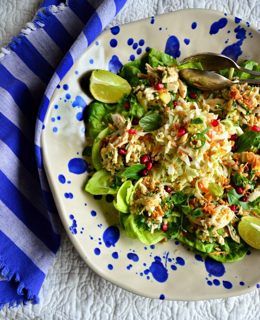 This Asian Poached Chicken Salad with pineapple has a simple Vietnamese style dressing and can be served in lettuce cups or as a salad. Perfect as a light dinner or an appetizer! #poachedchicken #chicken #salad #Asianrecipes www.thisishowicook.com