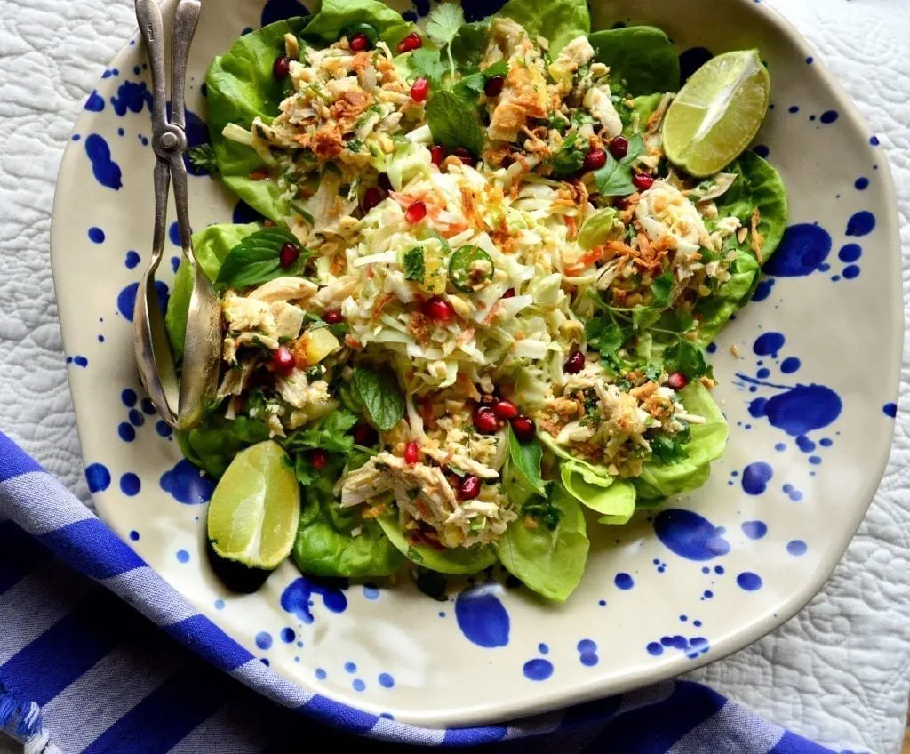 This Asian Poached Chicken Salad with crushed pineapple has a simple Vietnamese style dressing and can be served in lettuce cups or as a salad. Perfect as a light dinner or an appetizer! #poachedchicken #chicken #salad #Asianrecipes www.thisishowicook.com