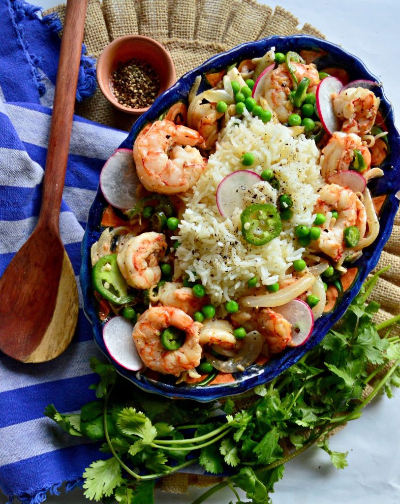 This quick and easy, ready in 20 minutes, Mexican pepper shrimp is made with onions, garlic, fresh green chilies and lots of black pepper. You may think this is over the top spicy, but the onion and garlic mellow it out! #shrimp #Mexicanrecipes #QuickDinners www.thisishowicook.com Black Pepper Mexican Shrimp