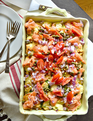 This overnight bagel bread pudding is perfect for brunch. Topped with lox and all the extras, this everything bagel breakfast is a winner. #overnightbreakfastcasserole #everythingbagel #breakfast www.thisishowicook.com