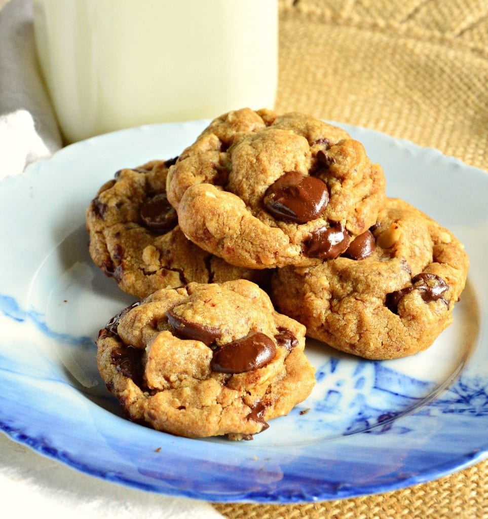 Peanut Butter Chocolate Chip Cookies are not your traditional peanut butter cookie. They aren't sandy and crispy, but chewy and soft. They are loaded with peanut butter! Oatmeal gives this cookie texture and the chocolate sweetness. This isn't an overly sweet or rich cookie, but just right. Perfect packing for picnics and perfect with a tall glass of milk! #cookies #baking #peanutbutter See more at This is How I Cook.com