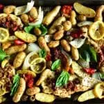 sheet pan with chicken, olives, basil, peppers