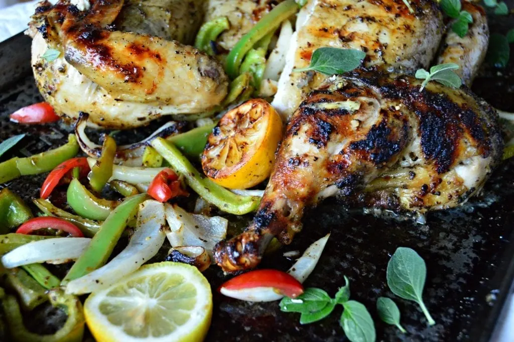 grilled chicken with lemon and peppers.