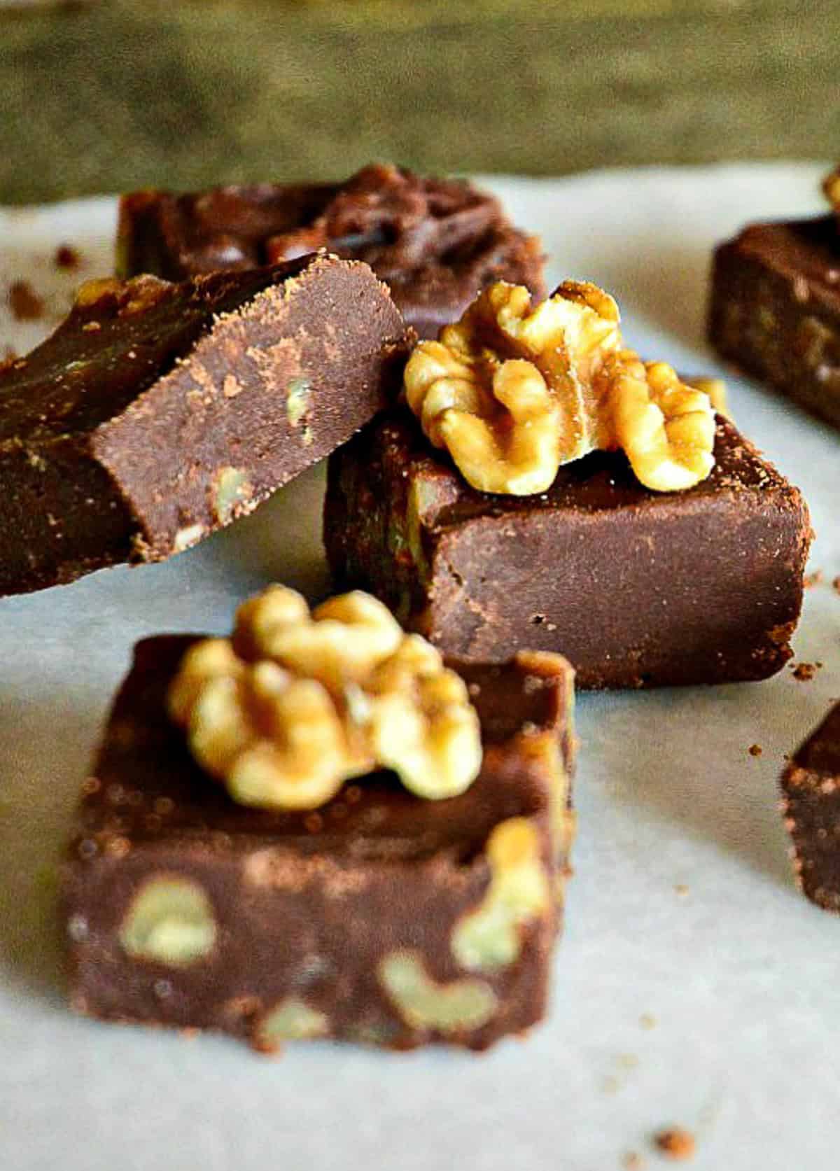 squares of homemade fudge on marble slab