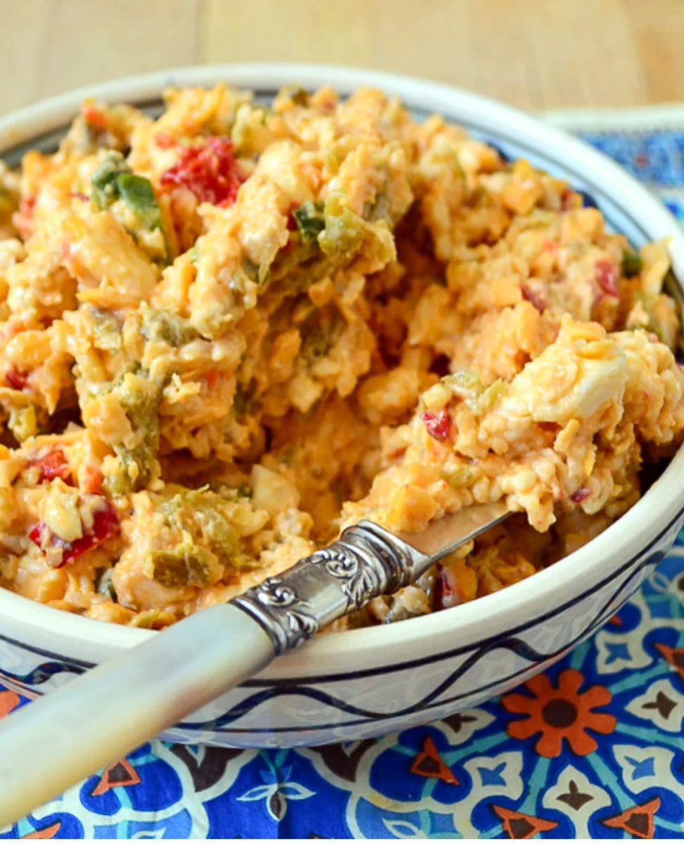 spicy pimento cheese/knife/blue napkin