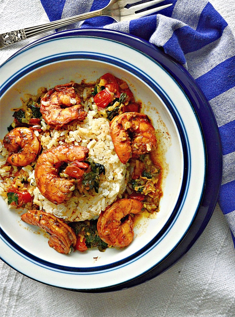 Shrimp with Pickapeppa Sauce on a white and blue plate