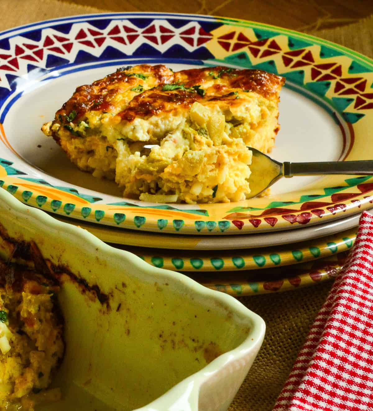 overnight mexican breakfast casserole on colorful plate