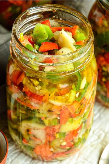 chicago style giardinera recipe in mason jar with serving spoon