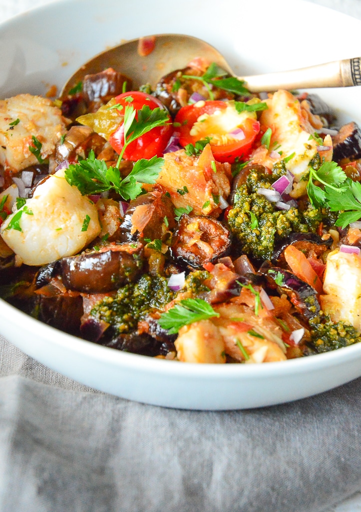 Fish Stew with Eggplant in white bowl with spoon