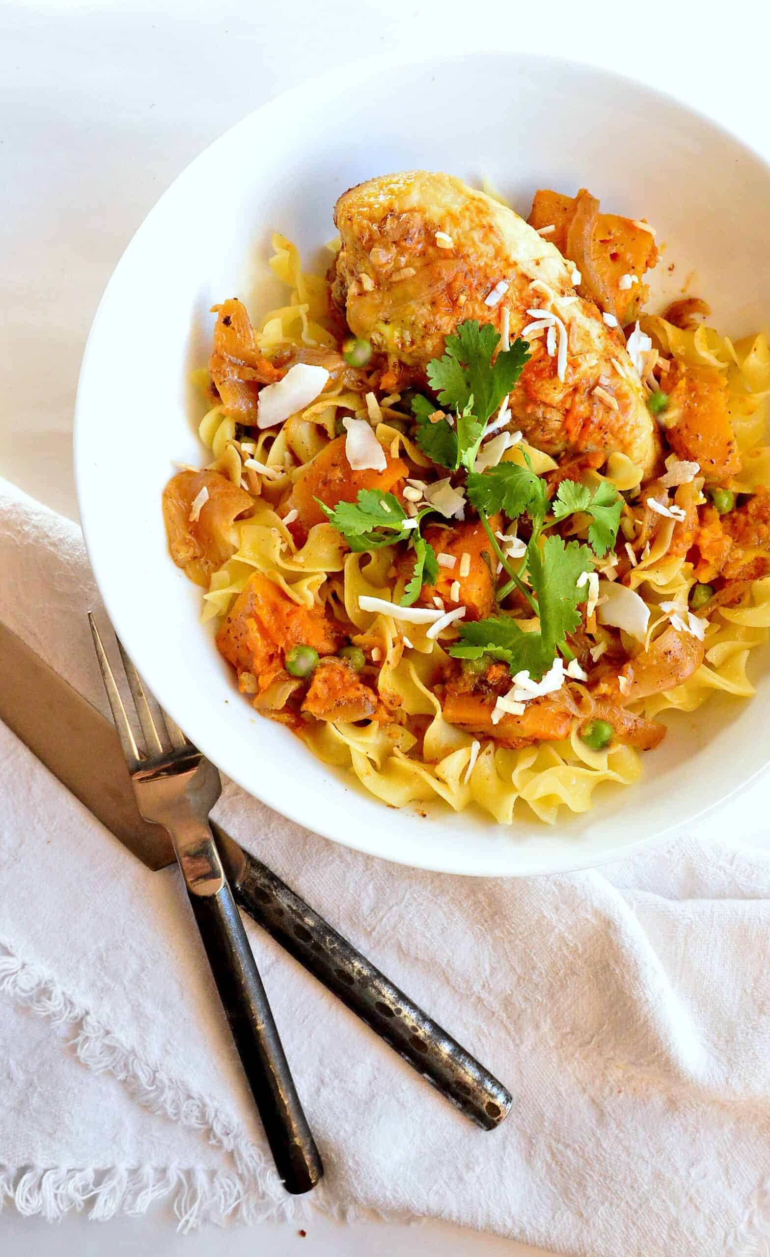 coconut squash chicken on white plate