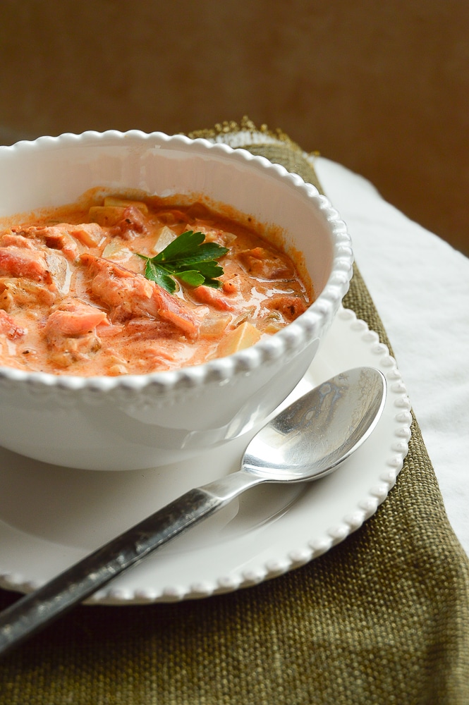 Smoked Salmon Chowder with Spoon on green place mat