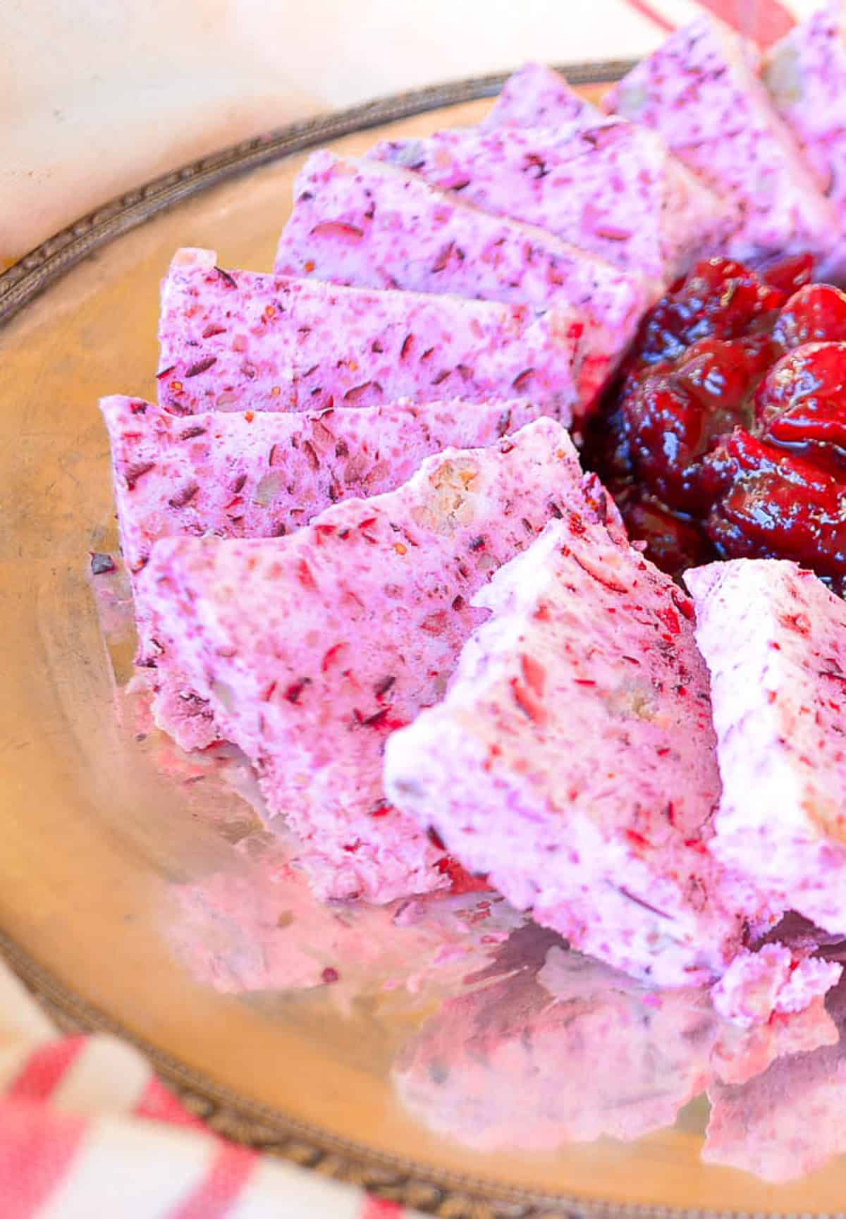 frozen cranberry salad cut into slices for serving