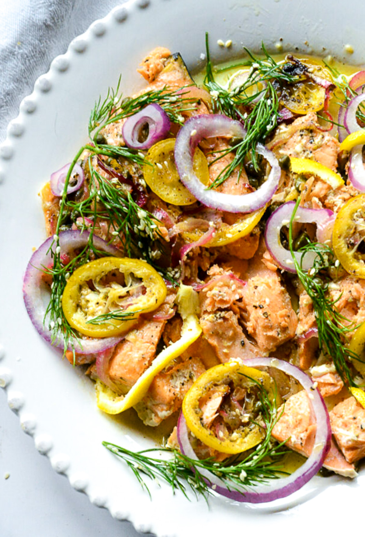 lemon salmon recipe with brown butter on white plate