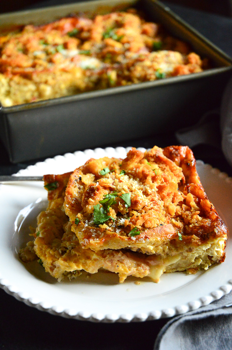 Egg Cheese adn Ham Casserole Slice on white plate