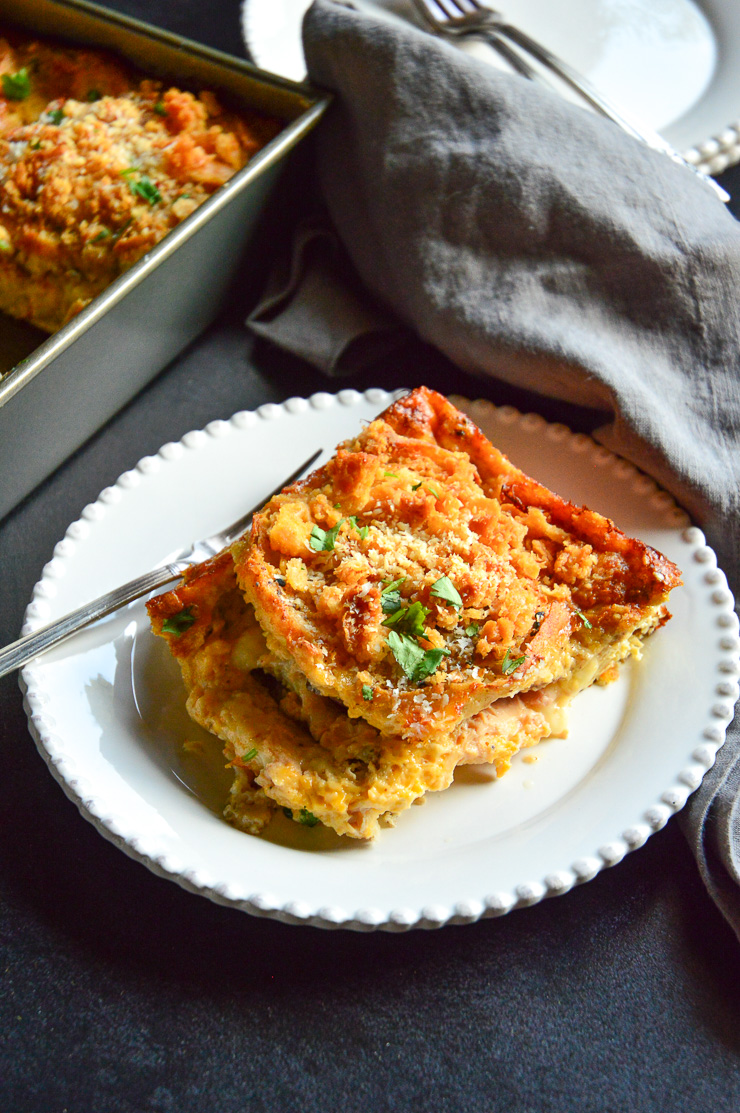 Egg Cheese and Ham Casserole with Fork on white plate