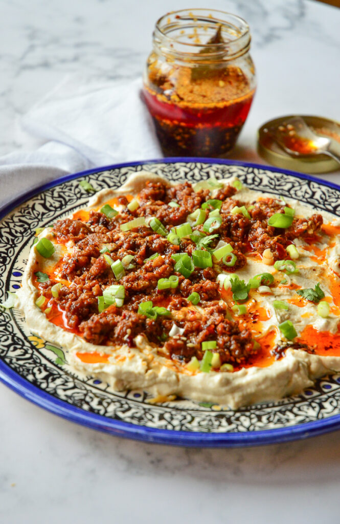 Szechuan Tofu with chili oil on decorative plate