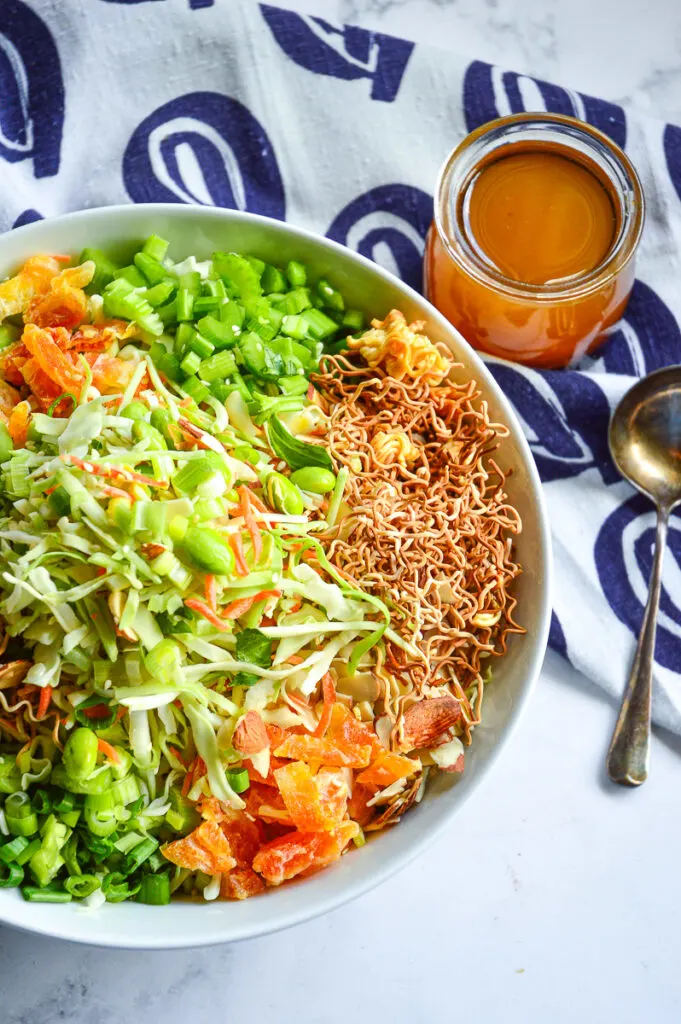 Ramen Noodle Salad, dressing, blue pattern napkin