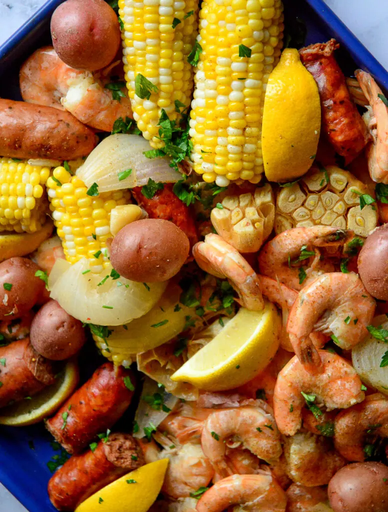 shrimp boil on blue sheet pan