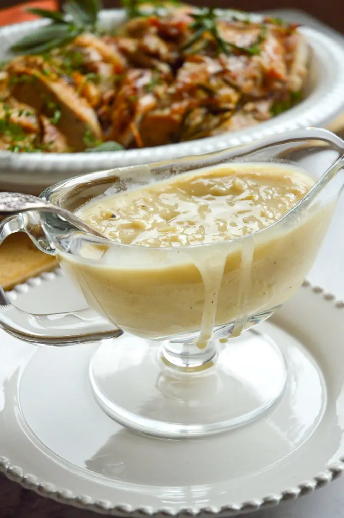 gravy without drippings in gravy boat with sliced turkey