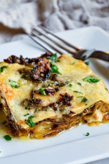 porcini mushroom lasagna on white plate