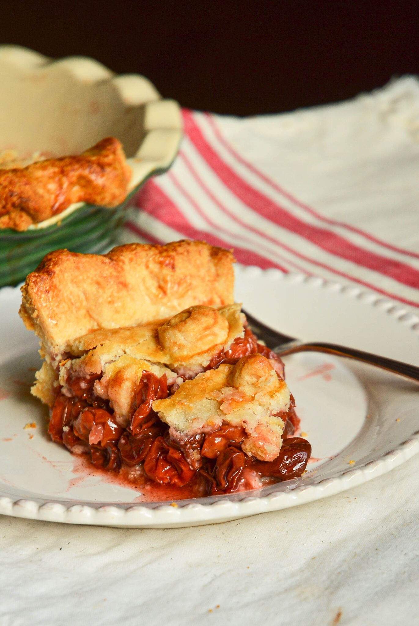 cherry pie recipe with frozen cherries on white plate